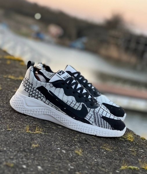 کتونی حراجی NIKE بافتی طوسی مشکی سفید